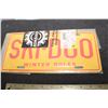 Image 1 : Ski-doo license plate w/ original Bombardier parts envelope