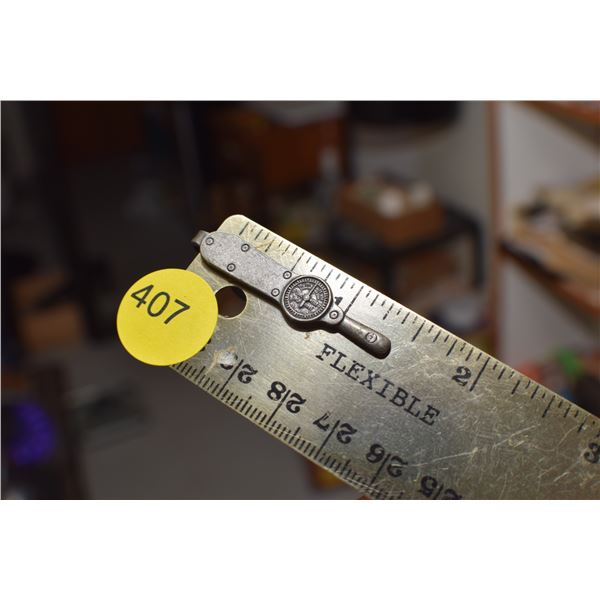 Antique torque wrench tie clip