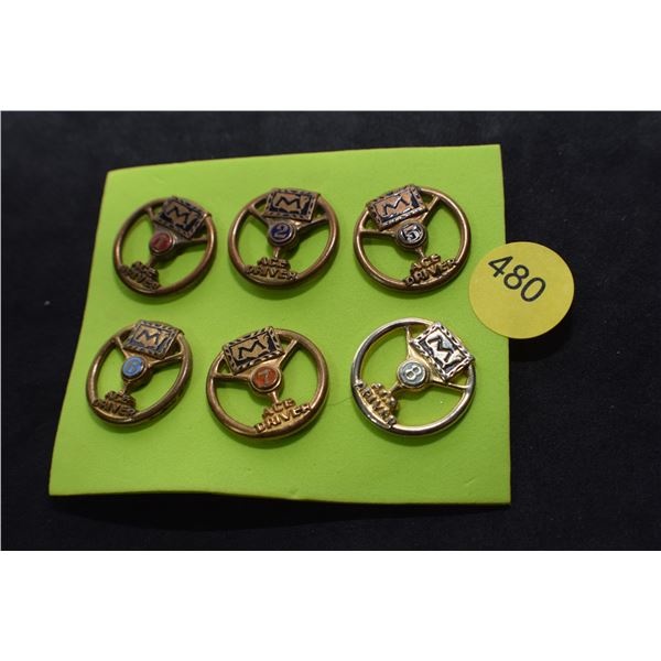 Vintage driving award pins