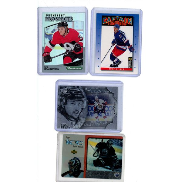 Hockey card lot include Curtis Joseph Upper Deck Caged Ice and a rookie card Erik brannstrom, Cujo