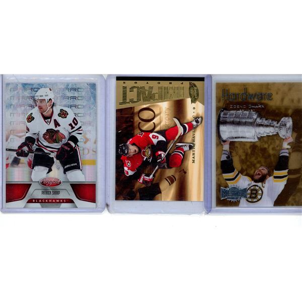 Hockey card lot includes Chara acetate card