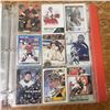 Image 13 : packed binder assorted hockey cards tons of goalies plus serial numbered Joe Sakic card plus rookies