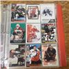 Image 8 : packed binder assorted hockey cards tons of goalies plus serial numbered Joe Sakic card plus rookies