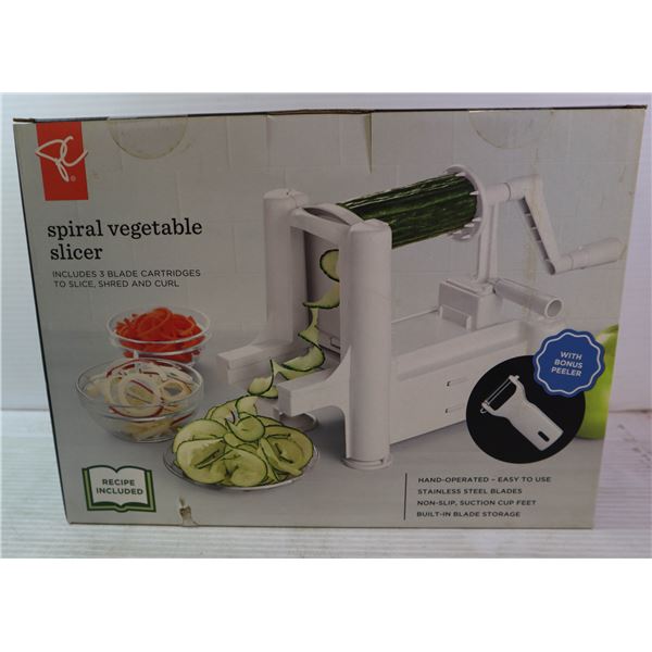 NEW IN BOX SPIRAL VEGETABLE SLICER. WITH BONUS