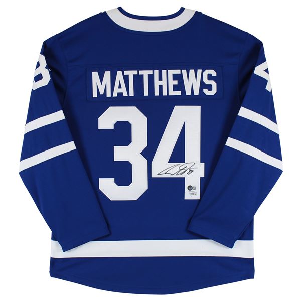 AUSTON MATTHEWS SIGNED MAPLE LEAFS BLUE FANATICS JERSEY (FANATICS COA)