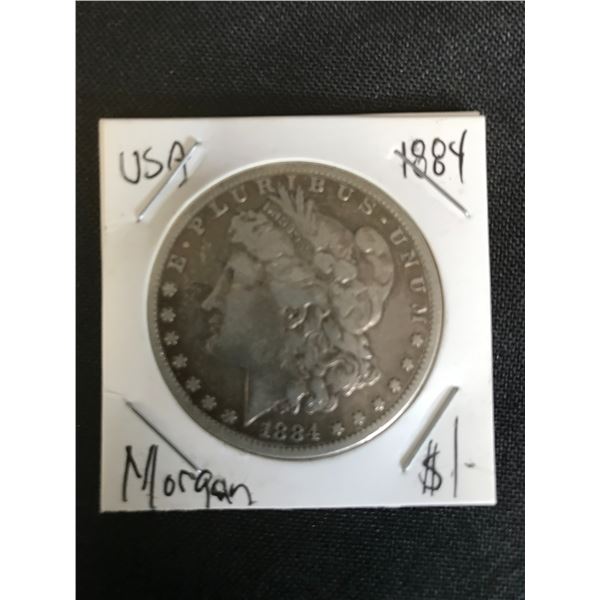 1884 MORGAN SILVER DOLLAR .900 SILVER