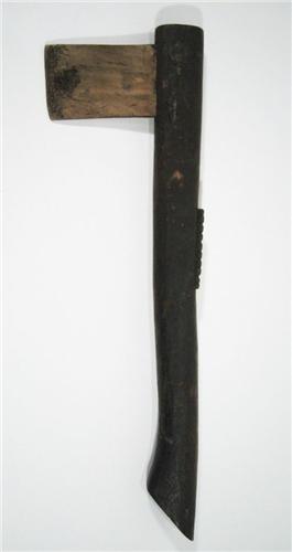 A RARE HERMIT ISLAND AXE, shell section blade