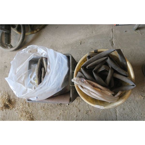 Crate of Gloves and Garbage Can of Bike Tire Tubes