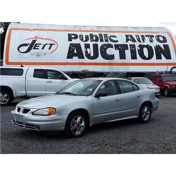 A9 --  2003 PONTIAC GRAND AM SE , Grey , 200613  KM's