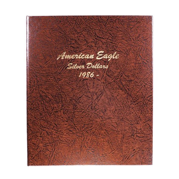 Lot of 1986-2016 $1 American Silver Eagle Coins in Book