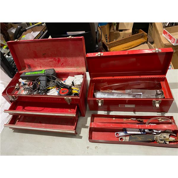 Two red tool boxes with contents