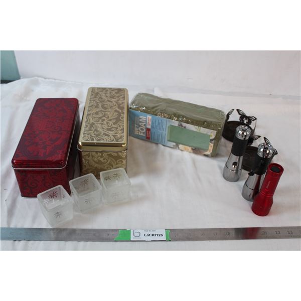 Candle holders, flashlights, foam block, floral tins