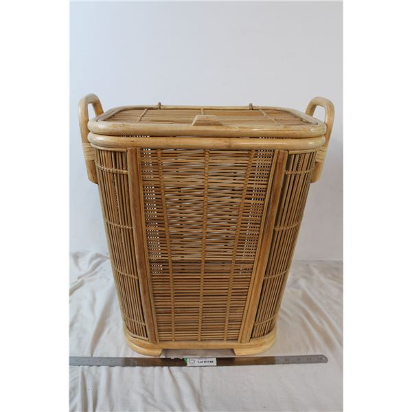 Possibly wicker or bamboo, woven basket 1'11" tall, 1'9" wide