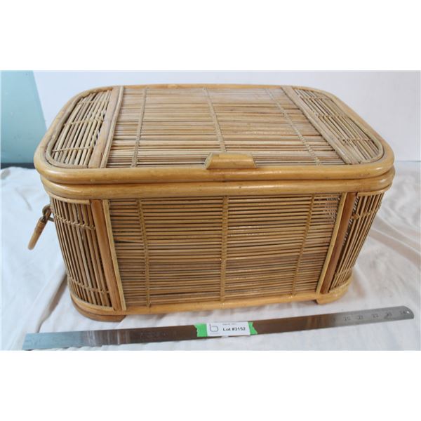 Possibly wicker or bamboo, woven basket 11" tall, 1'8" wide