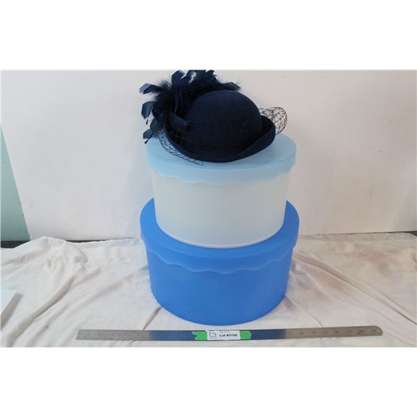 2 plastic hat containers with fancy ladies hat