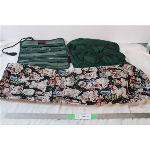 Two matching rollied up storage bags, snowman storage bag