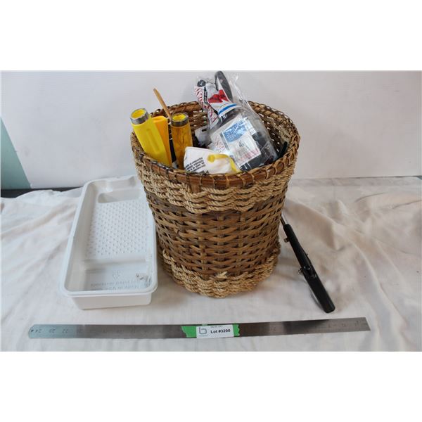 Handsaw with bucket of painting supplies