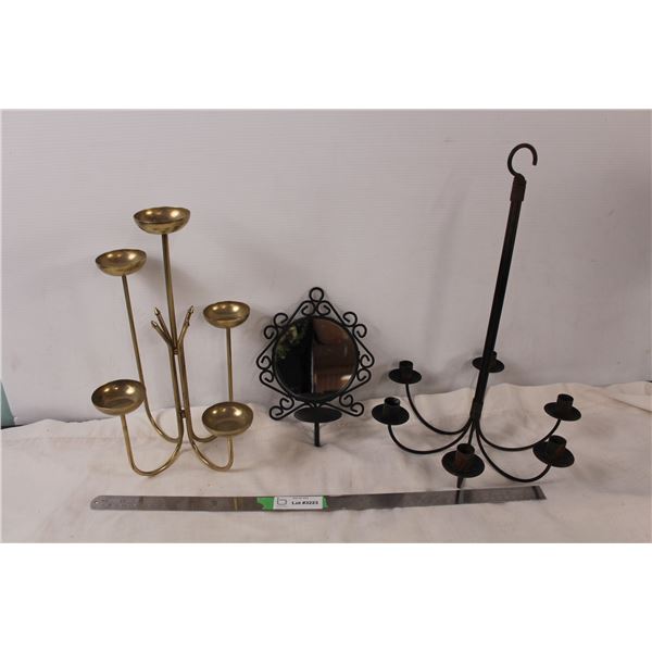 Three candle holders, one with mirror