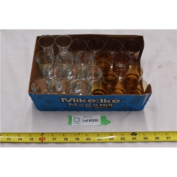 Multiple sets of shot glasses