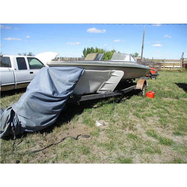 checkmate 21ft boat with johnson javelin 100 (works good, comes with fuel tanks, ski poles, tube) wi