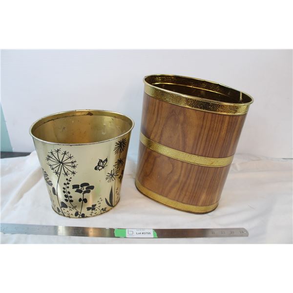 Two waste bins, one rusted out bottom