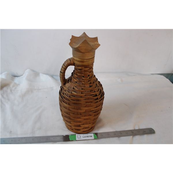 Glass bottom with woven reed or wicker