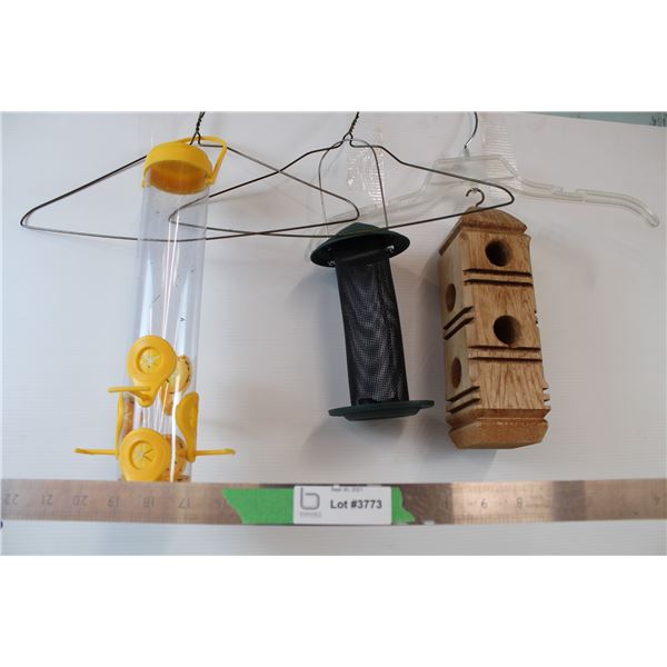 3 hanging bird feeders