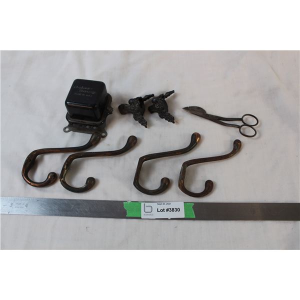 Wall hooks, scissors, and other things