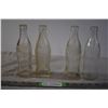Image 1 : 1953, 1954, and 1956 Coca-Cola Bottles