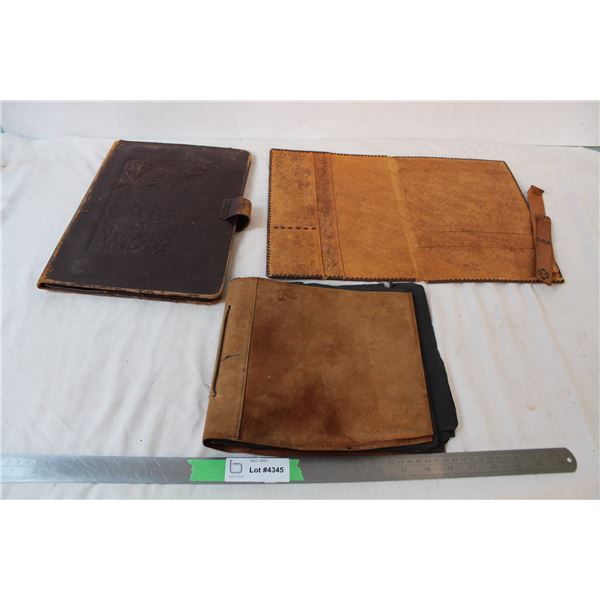 2 leather binders, 1 leather photo album