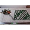 Image 1 : Fishing net filled with various hooks, Saskatchewan Roughriders handkerchief