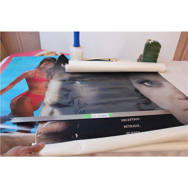 Assorted posters; for movies, beer, swimsuit ladies