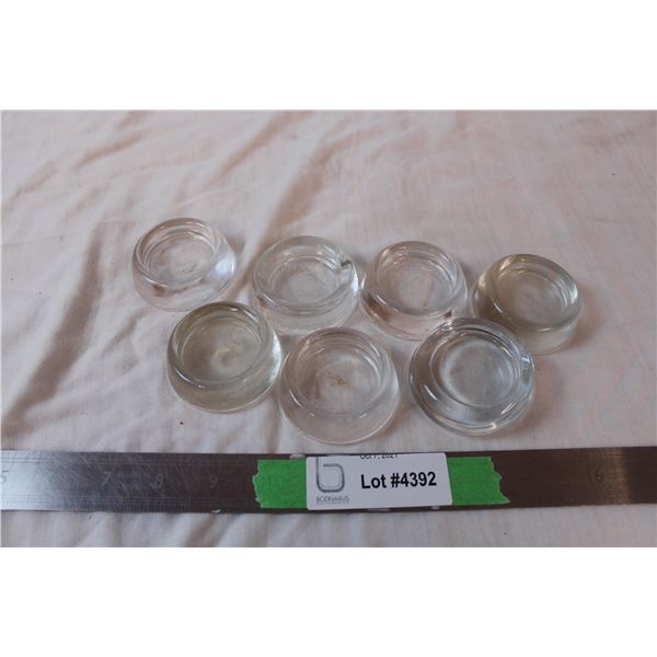 Seven vintage glass table feet, made in Canada