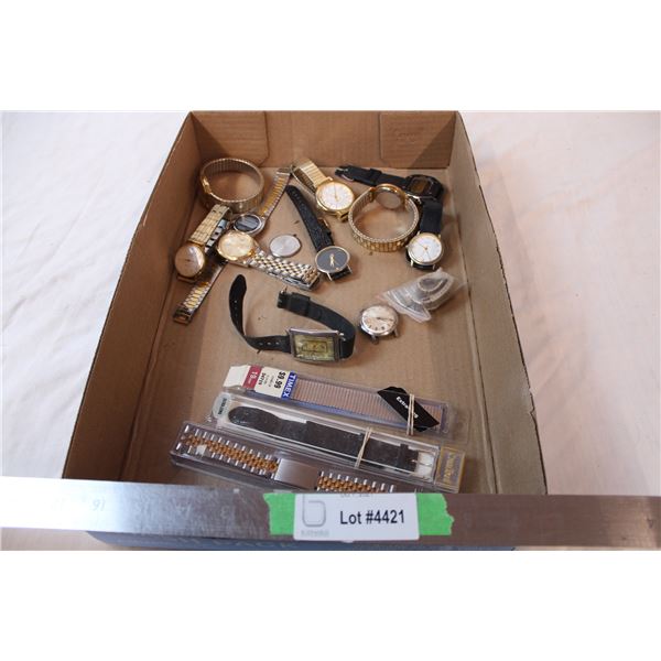 Box of watches and watch parts for repair