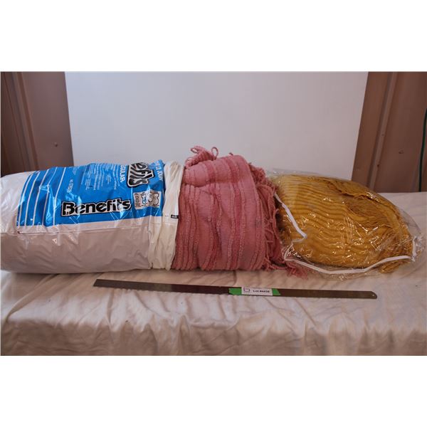 Bags of blankets, pink and yellow vintage