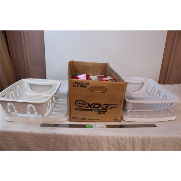Plastic dish racks and a box of lightbulbs