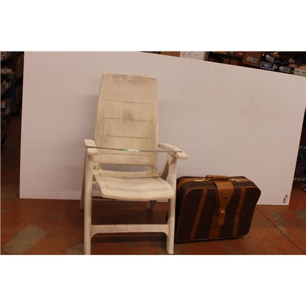 weathered plastic folding chair, Impala rolling suit case