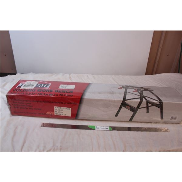 Folding workbench, sealed in box. 13.75”x23.75”x31”