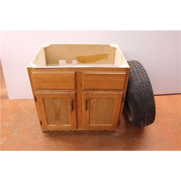 Wooden cabinet, with contents 29.5”x21”x29” and tire