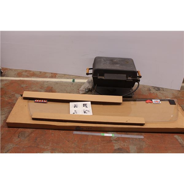 Back window for a halfton truck, and a tabletop bbq