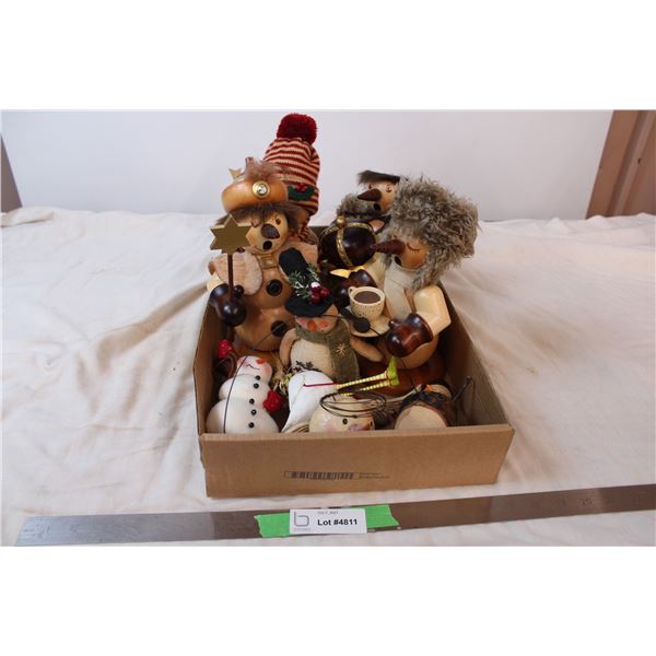 Various wooden snow man decor, and a chicken