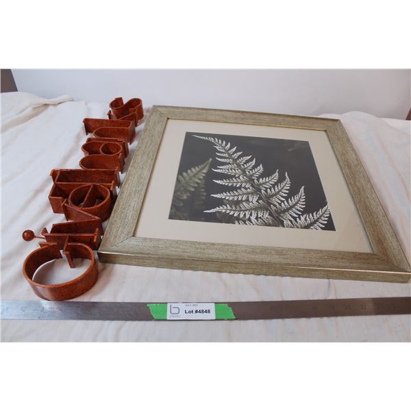 Framed art print and metal decor