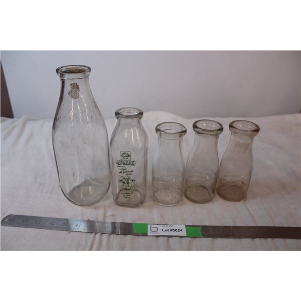 Variety branded dairy bottles