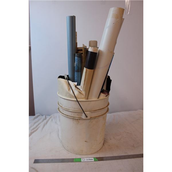 Bucket of various posters