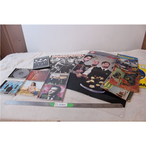Various comics, music cd’s, Good Charlotte dvd and poster, Village people record