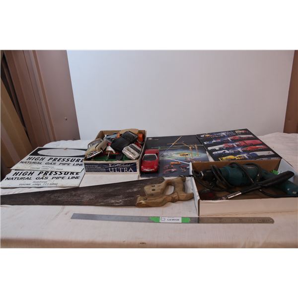 Plastic car models, model car posters, saskEnergy signs, misc. Tools