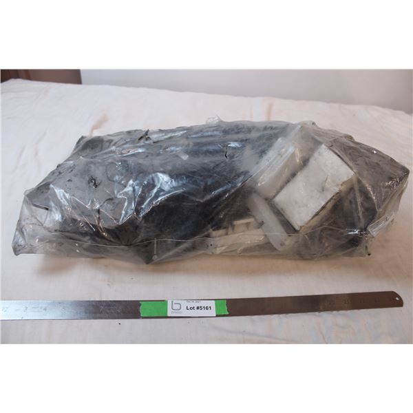 Bag of power adapters and outlets