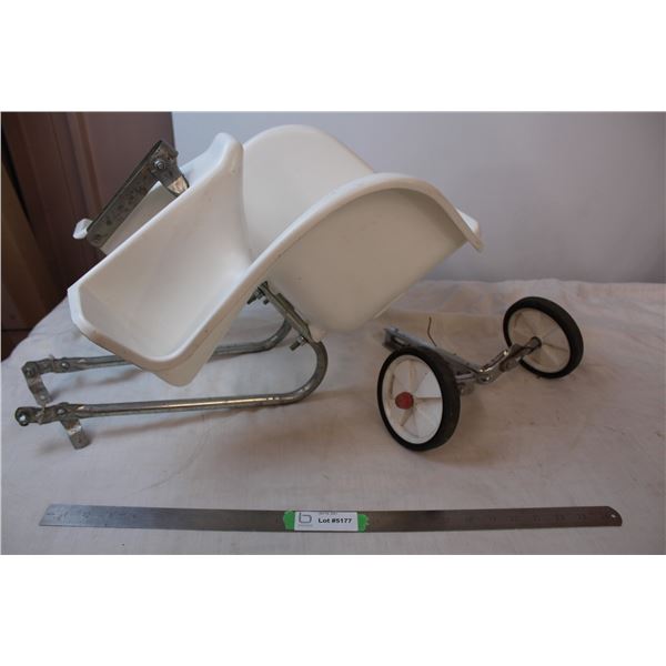 Child’s bicycle seat and training wheels