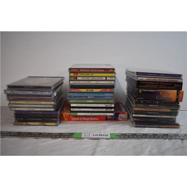 CDs and Disney VHS Tape