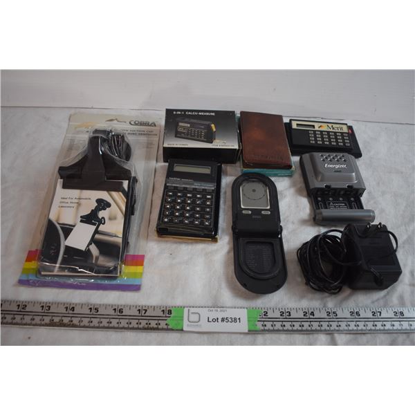 Calculators, Battery Charger, and Car Clipboard